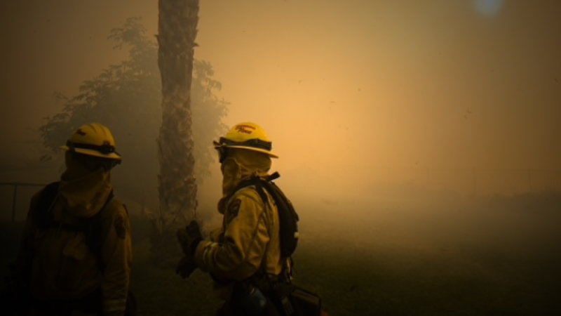 Firefighters monitor a Simi Valley property threatened by the Easy Fire, which started Wednesday in Ventura County, west of Los Angeles, amid gale-force winds and single-digit humidity. MUST CREDIT: Photo by Stuart W. Palley for The Washington Post