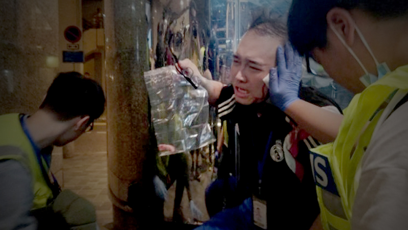Six wounded as knife attack caps day of Hong Kong political chaos Six wounded as knife attack caps day of Hong Kong political chaos