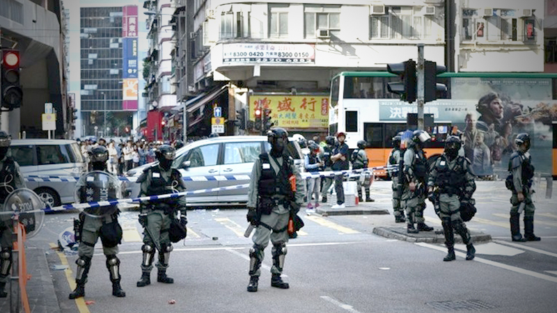 Hong Kong police shoot at pro-democracy protesters Hong Kong police shoot at pro-democracy protesters