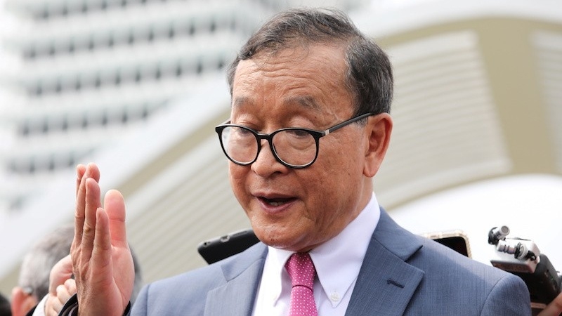 Self-exiled Cambodian opposition party founder Sam Rainsy speaks to members of the media after visiting Parliament House in Kuala Lumpur on Nov. 12. (Reuters/Lim Huey Teng)