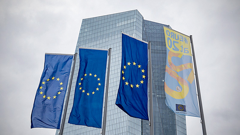 The stars of the European Union (EU) sit on banners flying outside the European Central Bank (ECB) headquarters in Frankfurt, Germany, on Nov. 27, 2019. MUST CREDIT: Bloomberg photo by Peter Juelich.