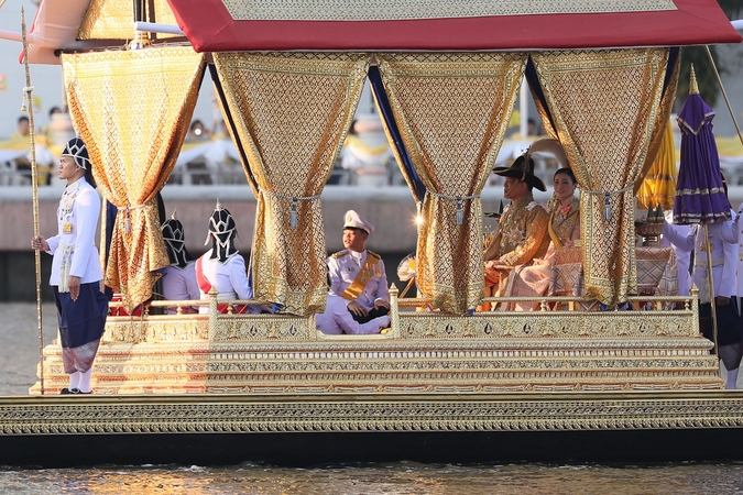HM on board as royal barge procession gets under way HM on board as royal barge procession gets under way