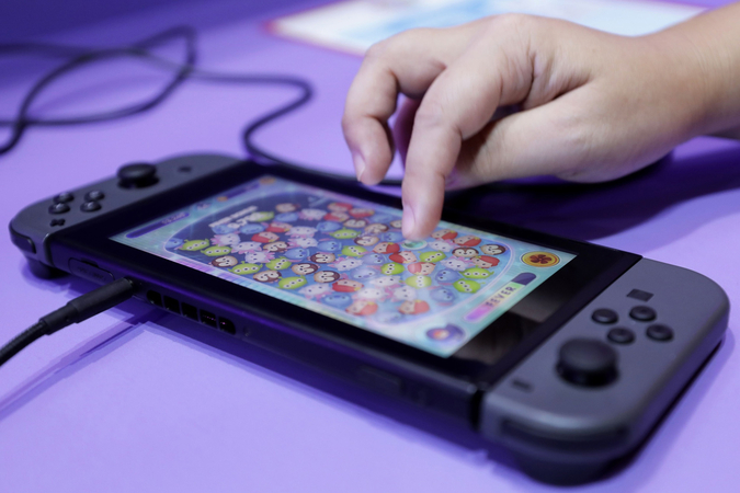 Nintendo could sell as many as four million Switch units in China in the fiscal year ending March and 12 million units of software, equity researcher Pelham Smithers estimates. MUST CREDIT: Bloomberg photo by Kiyoshi Ota