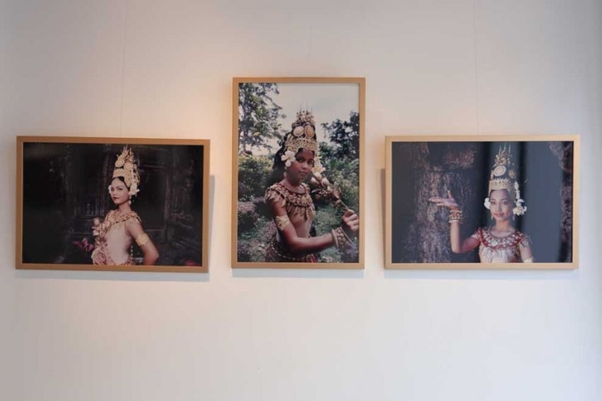Photographs taken by Arjay Stevens show Apsara dancers posing with elaborate hand gestures. Hong Menea
