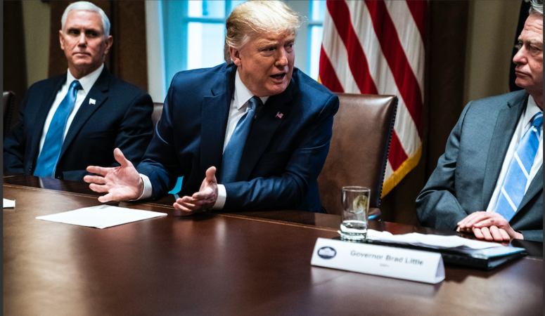 File Photo: President Trump (centre)