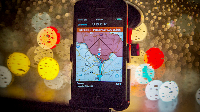 The driver app on the windshield of an UberX in 2014. MUST CREDIT: photo for The Washington Post by Evelyn Hockstein.