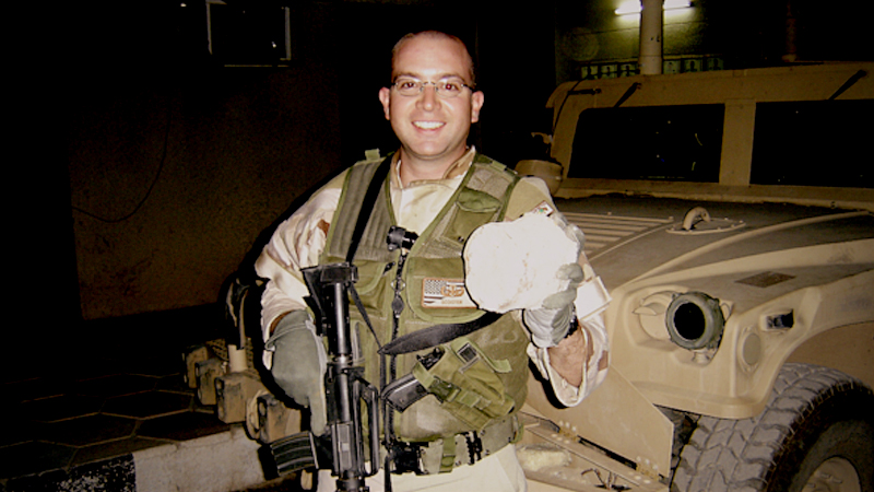 Brian Castner, a former Air Force explosive ordnance disposal officer, holds an EFP weapon in Kirkuk, Iraq, in June 2006. MUST CREDIT: Brian Castner.