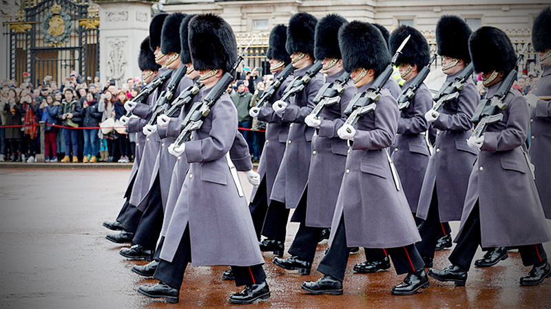 Coldstream Guards march after the Changing the Guard ceremony at Buckingham Palace in London on March 3, 2017. MUST CREDIT: Bloomberg photo by Luke MacGregor.