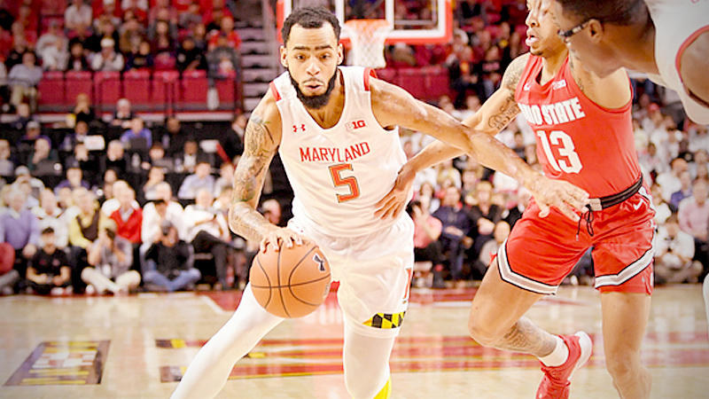 Maryland guard Eric Ayala drives to the basket against Ohio State guard CJ Walke. MUST CREDIT: Washington Post photo by Jonathan Newton
