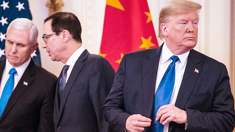 Vice President Mike Pence, left, Treasury Secretary Steven Mnuchin and President Trump confer before signing a trade agreement with China on Jan. 15. MUST CREDIT: Washington Post photo by Jabin Botsford
