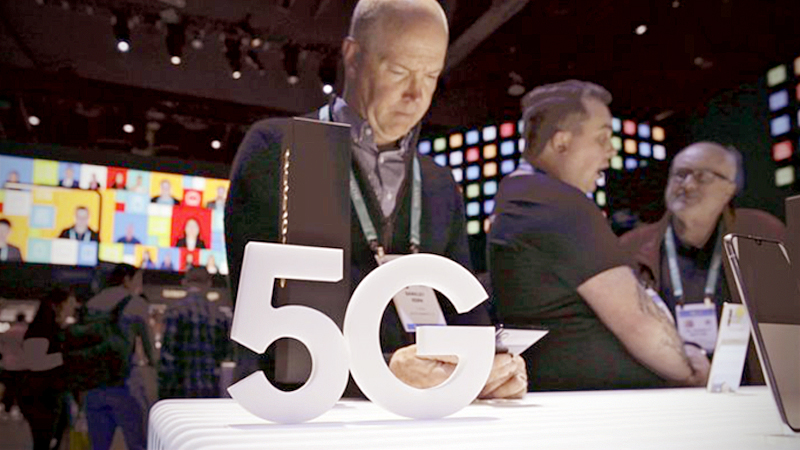 The Associated Press
People look at 5G phones at the Samsung booth during the Consumer Electronics Show in Las Vegas on Jan. 7.