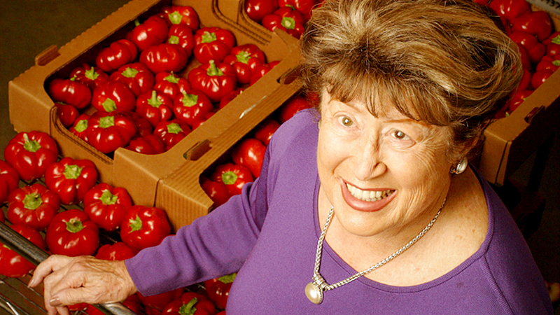 Frieda Caplan, shown here in 2003, displays the toma bella, a pepper and tomato hybrid. MUST CREDIT: Photo by Jonathan Alcorn for The Washington Post