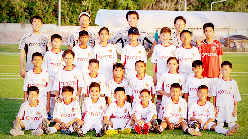 Young Thai soccer players coached by Nagoya Grampus team Young Thai soccer players coached by Nagoya Grampus team