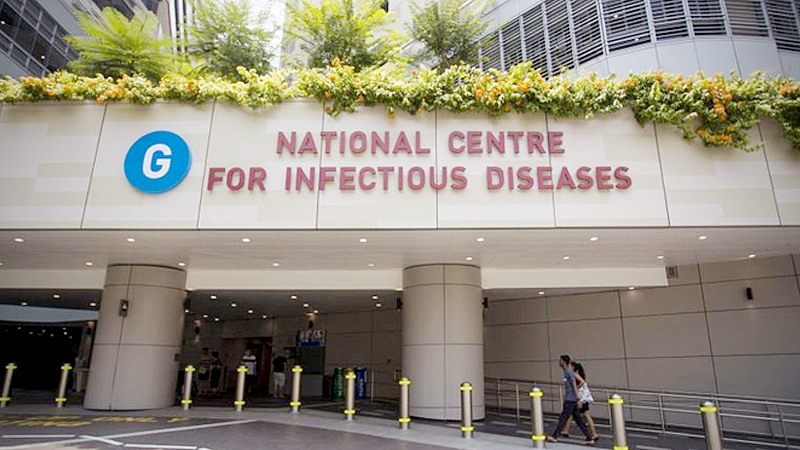 The 56-year-old woman from Wuhan, who arrived in Singapore with her family on Jan 18, is currently warded in an isolation room at the National Centre for Infectious Diseases and her condition is stable.PHOTO: LIANHE ZAOBAO