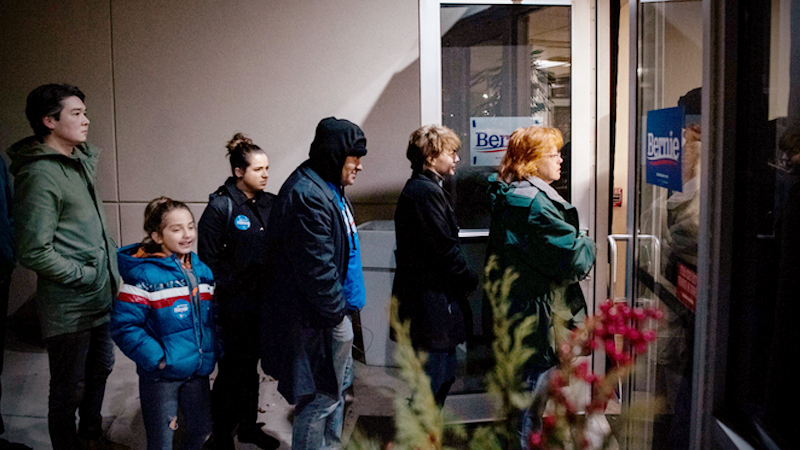 Supporters wait to get into a party for Sen. Bernie Sanders, I-Vt., in Des Moines, Iowa, on Monday, Feb. 3, 2020. MUST CREDIT: Washington Post photo by Salwan Georges