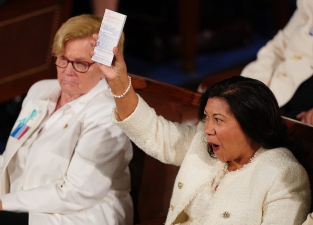 Rep. Veronica Escobar, D-Texas, holds the Constitution during the State of the Union address on Tuesday, Feb. 4, 2020. MUST CREDIT: Washington Post photo by Jabin Botsford