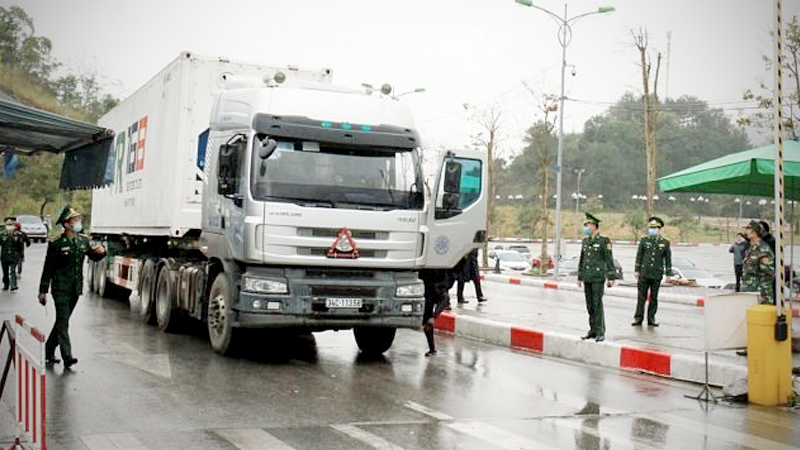 Photo: A truck carrying goods waits for clearance on Vietnam's border with China. Viet Nam News/ANN 