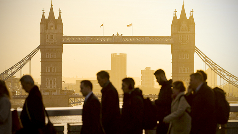 Commuters walk across London Bridge in London Feb. 3rd, 2016. MUST CREDIT: Bloomberg photo by Jason Alden.

