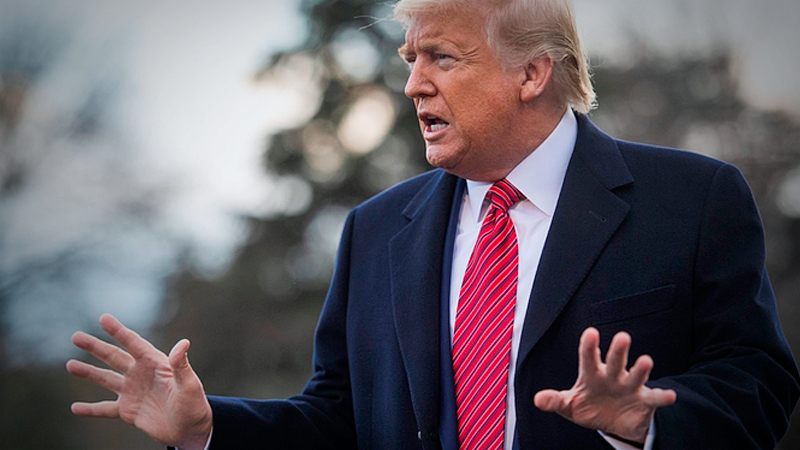 President Donald Trump speaks to the press outside the White House on Friday, adopting an optimistic tone about the coronavirus as he heads to a rally in South Carolina. Photo by Amanda Voisard for The Washington Post