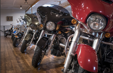 Harley-Davidson motorcycles stand in a showroom. MUST CREDIT: Bloomberg photo by David Paul Morris
