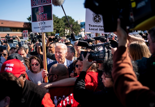 Former vice president Joe Biden joins Nevada Culinary Union members on the picket line outside the Palms Casino Resort in Las Vegas in February. Like many unions so far, it has not endorsed a candidate. MUST CREDIT: Washington Post photo by Melina Mara