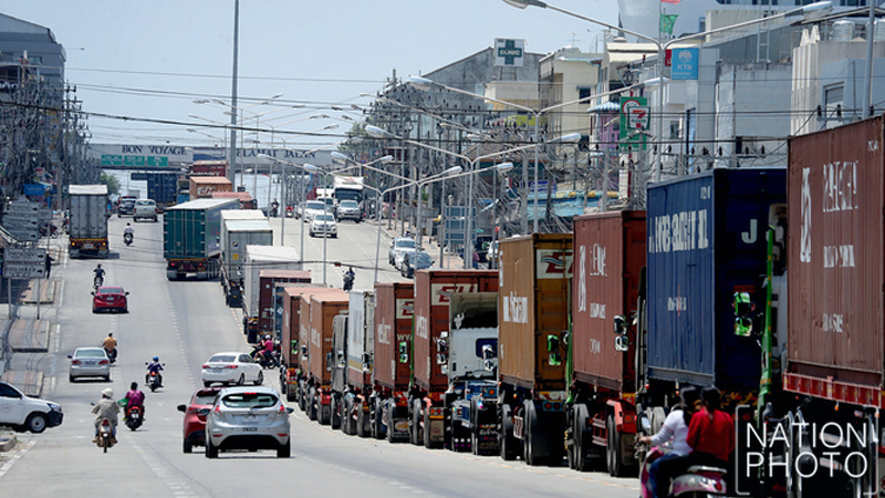 Thai-Malaysian checkpoint packed with travellers before border closure at midnight Thai-Malaysian checkpoint packed with travellers before border closure at midnight