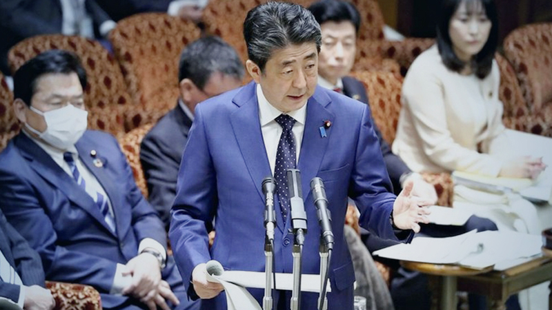 Prime Minister Shinzo Abe speaks about the possibility of postponing the Tokyo Olympics and Paralympics at the Diet on Monday.