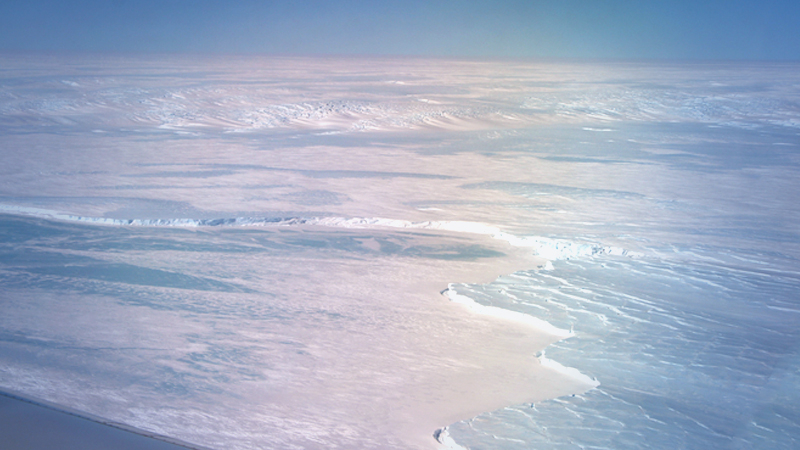 NASA's IceBridge mission flew over the Denman Glacier region, in East Antarctica, on Oct. 30, 2019. The glacier is creeping down a slope that plunges into extreme depths, new research finds, potentially igniting a feedback process that could unload trillions of tons of ice into the ocean. MUST CREDIT: Operation IceBridge/NASA