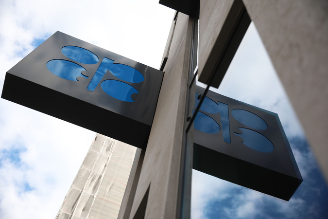 An OPEC sign hangs outside the OPEC Secretariat in Vienna. MUST CREDIT: Bloomberg photo by Akos Stiller.
