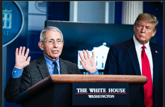 File photo of Anthony Fauci, left, and President Trump by Washington Post