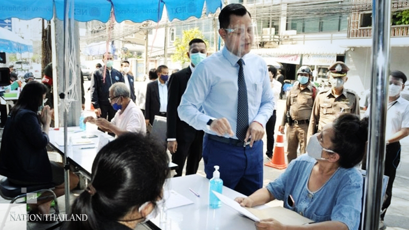 Finance Ministry shifts booths handling complaints dealing with Bt5,000 handouts Finance Ministry shifts booths handling complaints dealing with Bt5,000 handouts