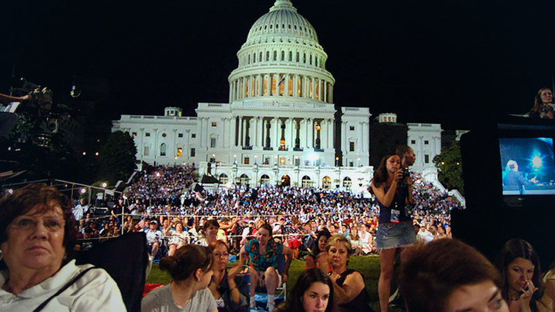 n this 2006 file photo, audience members react to a solemn tribute to those who have died during the National Memorial Day concert on the West Lawn of the Capitol. MUST CREDIT: Washington Post photo by Katherine Frey.
