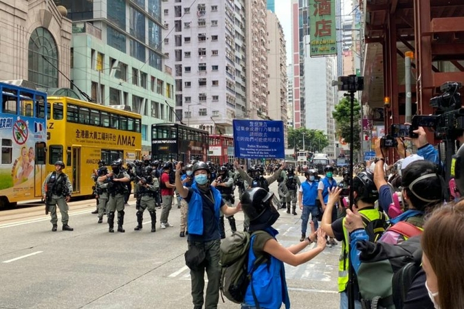 Hong Kong police fire tear gas amid renewed tensions, protests Hong Kong police fire tear gas amid renewed tensions, protests