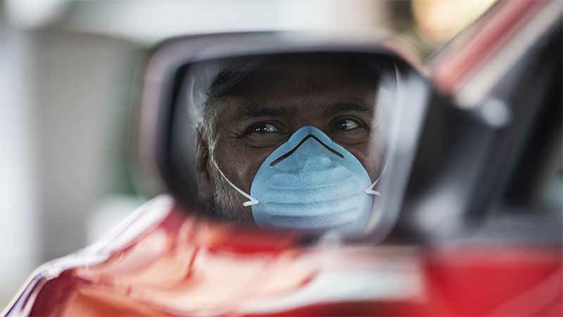 Sergio Rodriguez leaves UCHealth Medical Center of the Rockies in Loveland, Colo., on April 18 after a battle with covid-19 left him on a ventilator. Rodriguez, who works at the JBS Meatpacking plant in Greeley, Colo., stopped receiving pay when he began developing symptoms of the virus. MUST CREDIT: Photo for The Washington Post by Chet Strange