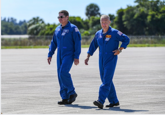 NASA astronauts Doug Hurley (right) and Bob Behnken arrive at Kennedy Space Center. They're scheduled to blast off May 27 atop a SpaceX Falcon 9 rocket, bound for the International Space Station. MUST CREDIT: Washington Post photo by Jonathan Newton