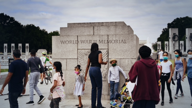 People gather at the World War II Memorial in Washington on Monday May 25, 2020 - Memorial Day. MUST CREDIT: Washington Post photo by Matt McClain
