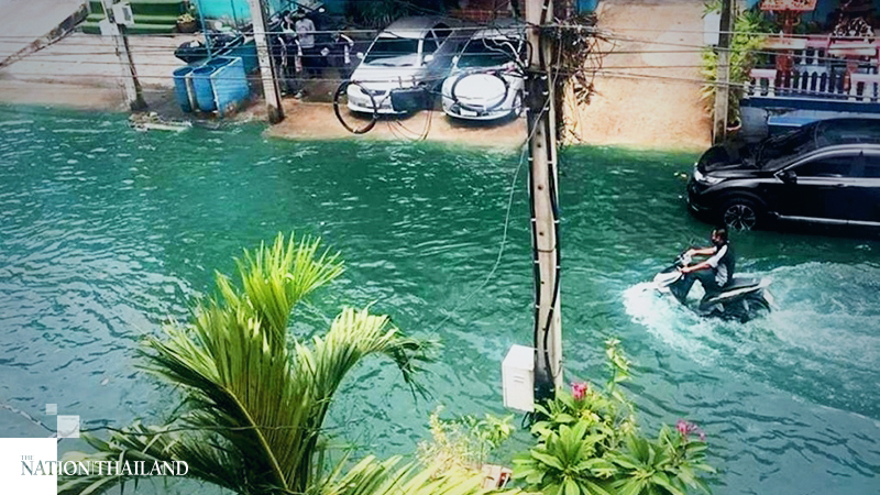 Bizarre bright-green floodwater triggers chemical leak fear Bizarre bright-green floodwater triggers chemical leak fear