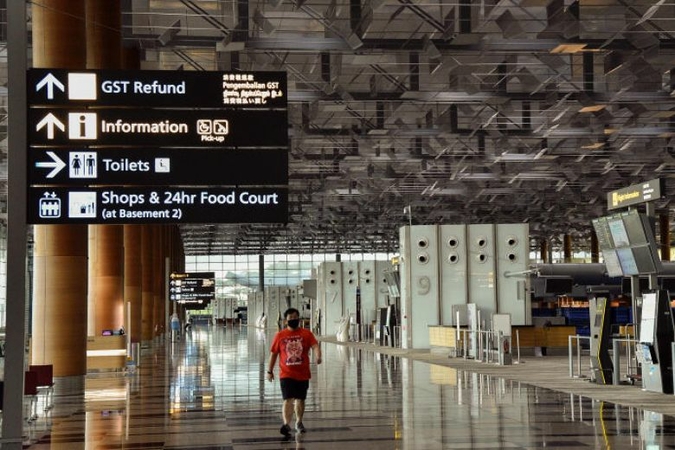 Protocols for essential travel would include testing travellers leaving and entering Singapore. ST PHOTO: DESMOND WEE