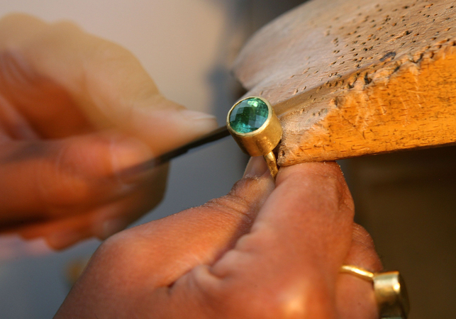 Jeweler Disa Allsopp files a gold and tourmaline ring in her studio in London on Jan. 3, 2008. MUST CREDIT: Bloomberg photo by Suzanne Plunkett