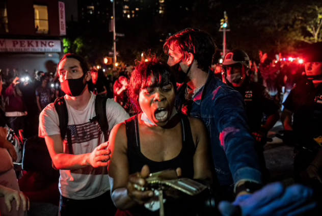 On Friday night, protesters took to the streets in Brooklyn near the 88th Police Department Precinct in New York. MUST CREDIT: Washington Post photo by Jabin Botsford