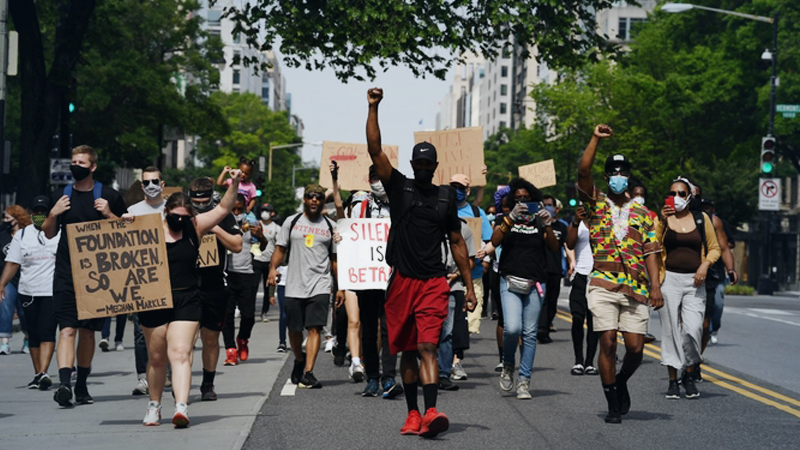 Demonstrators march down K Street NW on June 6, 2020. Large demonstrations were expected on to protest George Floyd's death in Minnesota. Washington Post photo by Matt McClain
