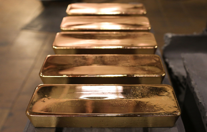 Freshly cast gold ingot bars sit in the foundry at the JSC Krastsvetmet non-ferrous metals plant in Krasnoyarsk, Russia, on Nov. 5, 2019. MUST CREDIT: Bloomberg photo by Andrey Rudakov.