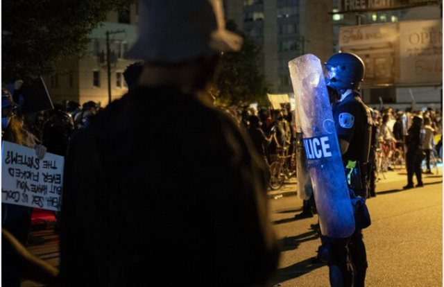 Police fire tear gas, pepper spray at Richmond protesters in standoff near police headquarters Police fire tear gas, pepper spray at Richmond protesters in standoff near police headquarters
