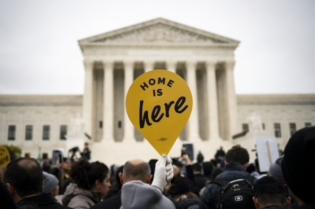 A demonstrator holds a Home Is Here sign during a rally supporting the Deferred Action for Childhood Arrivals program (DACA) outside of the Supreme Court in Washington, D.C., U.S., on Nov. 12, 2019. MUST CREDIT: Bloomberg photo by Al Drago