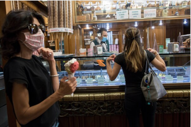 Customers shop for gelato at Giolitti in Rome on June 6, 2020. MUST CREDIT: Photo for The Washington Post by Ginevra Sammartino