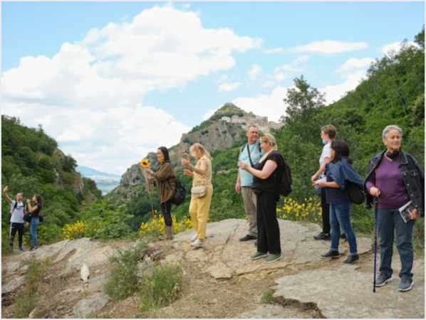 The first tour bus arrived in San Fele this past week. MUST CREDIT: Photo by Federica Valabrega for The Washington Post.