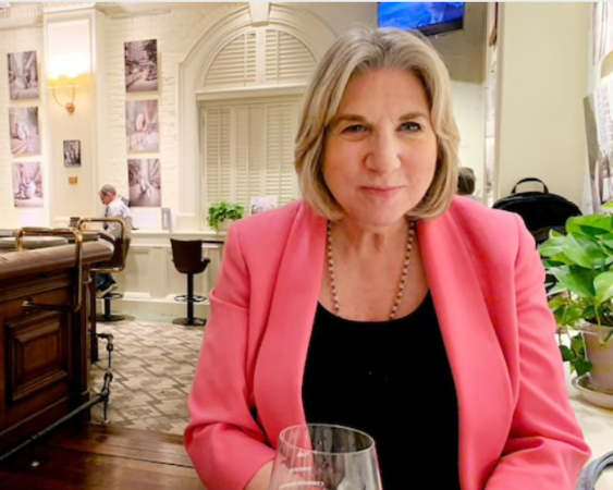 Jodi Schneider, president of the Hong Kong Foreign Correspondents' Club, at the club's bar. MUST CREDIT: Photo for The Washington Post by Jeff Stein
