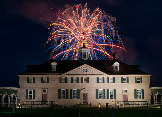 The fireworks show June 27 at Mount Vernon, George Washington's home near Washington. Attendance was restricted to 600, from the normal 2,700, and fireworks were launched from a barge anchored in the Potomac River. MUST CREDIT: Photo for The Washington Post by Kevin Ambrose