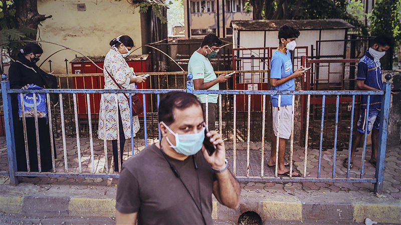 File photo: People in India wear masks.