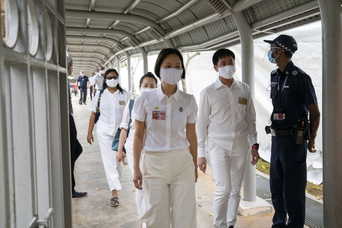 Virus tips Singapore politicians into social media face off Virus tips Singapore politicians into social media face off